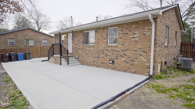 view of front of house with central air condition unit