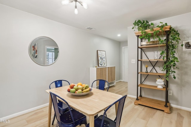 dining room featuring light wood-type flooring