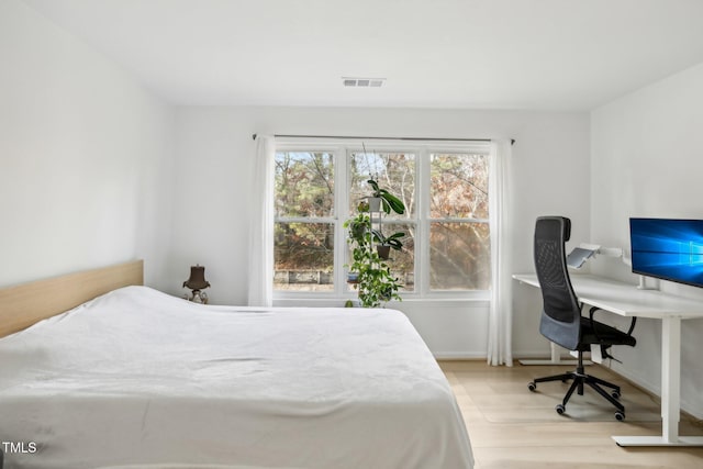 bedroom featuring light hardwood / wood-style flooring