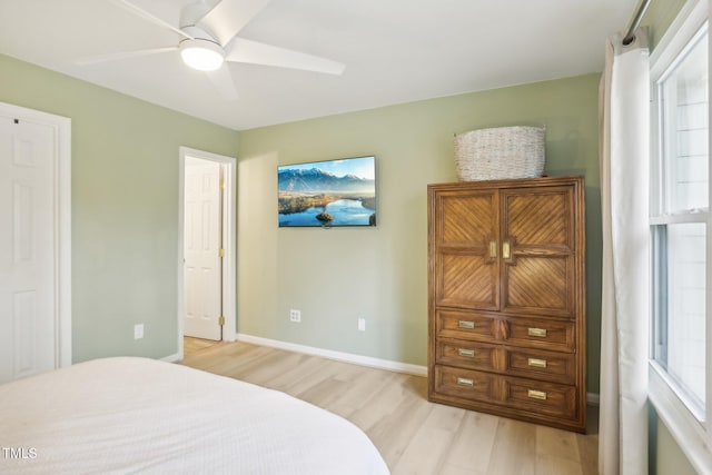 bedroom featuring ceiling fan and light wood-type flooring