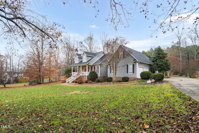 view of home's exterior with a lawn and covered porch