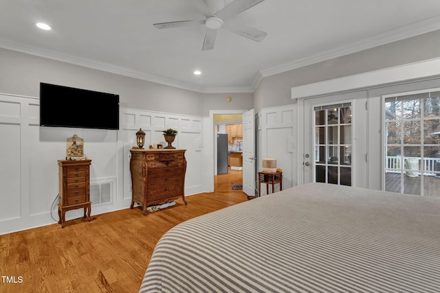 bedroom featuring access to exterior, ceiling fan, stainless steel fridge, crown molding, and light wood-type flooring