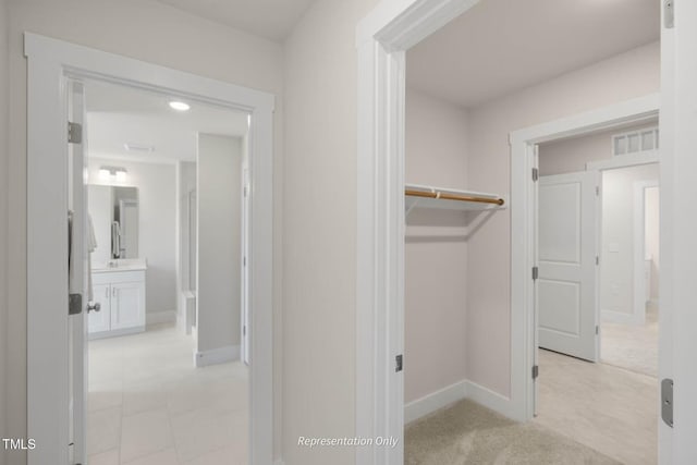 interior space featuring light colored carpet