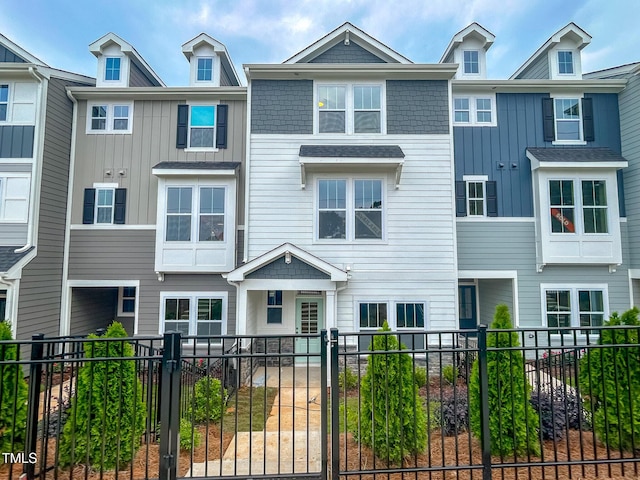 207 Pond View Ct Unit 3, Fuquay Varina, NC 27526 - view of property with board and batten siding