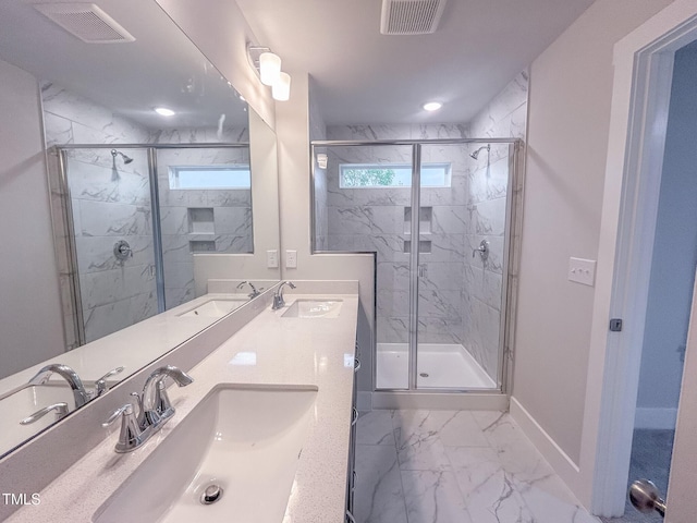 207 Pond View Ct Unit 3, Fuquay Varina, NC 27526 - bathroom featuring marble look tiles, double vanity, a marble finish shower, and baseboards