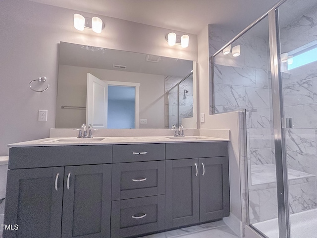 207 Pond View Ct Unit 3, Fuquay Varina, NC 27526 - bathroom with double vanity, marble look tiles, and a marble finish shower