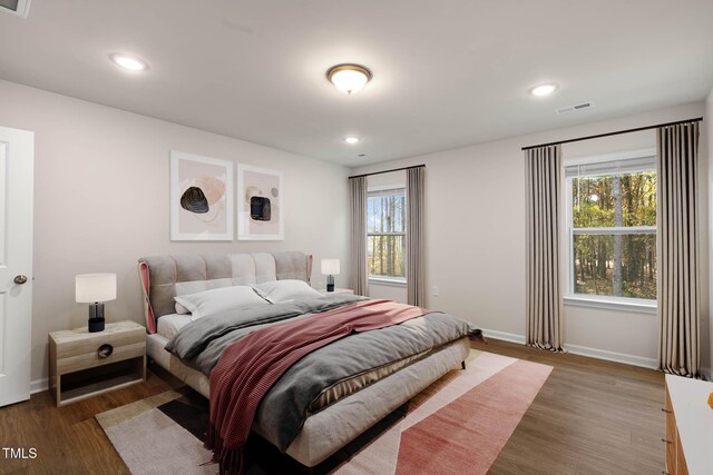 bedroom featuring dark hardwood / wood-style floors