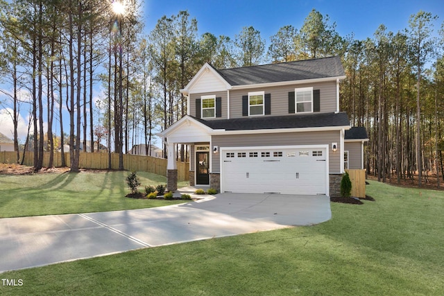 view of front of property with a front yard and a garage