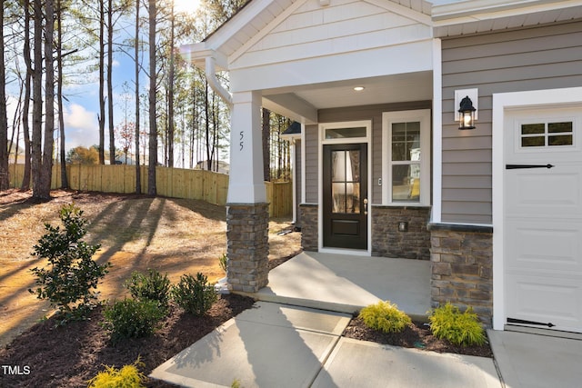 doorway to property with a porch