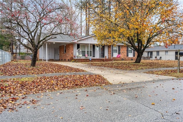 view of front of home with a carport