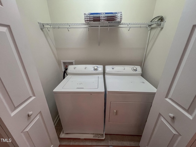 laundry area featuring washing machine and dryer