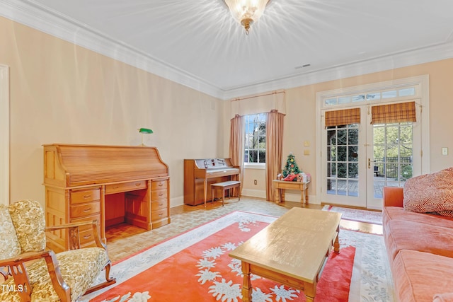 interior space with crown molding and french doors