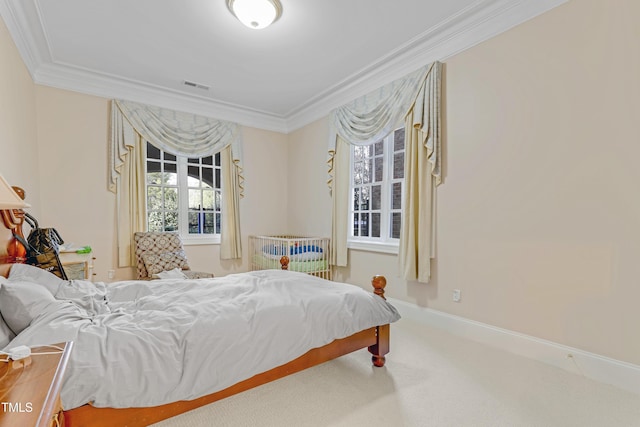 bedroom featuring carpet and crown molding