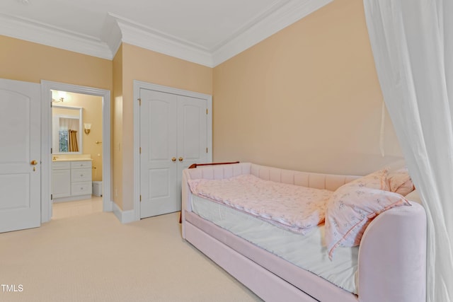 carpeted bedroom featuring connected bathroom and crown molding