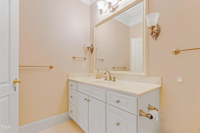 bathroom with vanity and ornamental molding