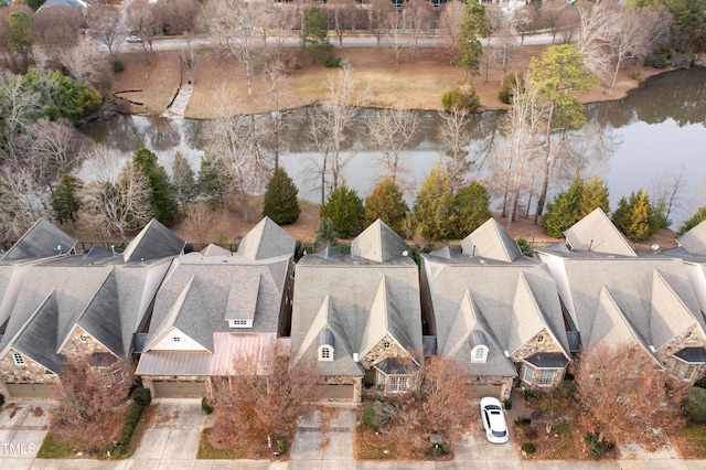 bird's eye view with a water view