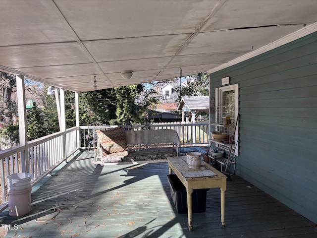 wooden deck with an outdoor hangout area