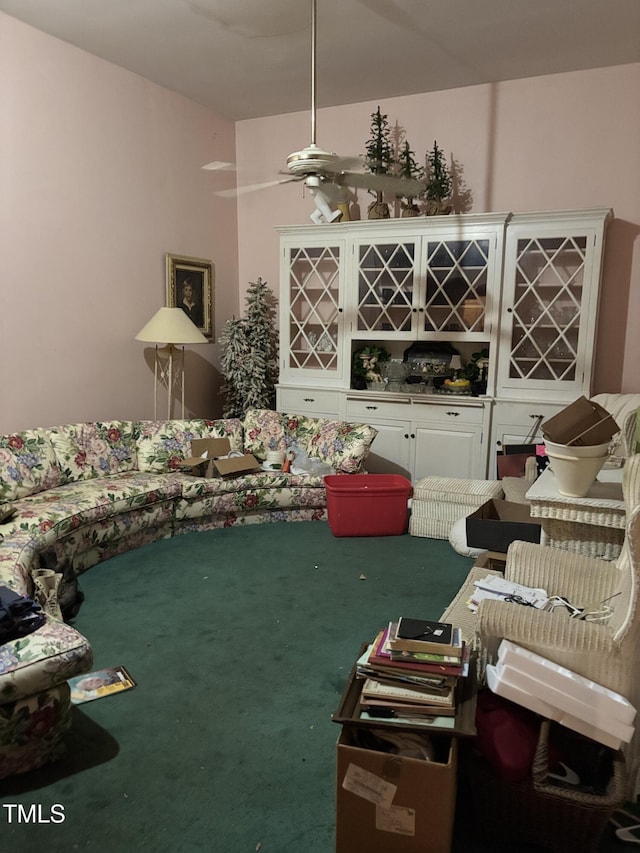 living room with carpet floors and ceiling fan