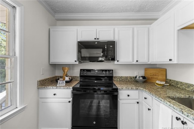 kitchen featuring white cabinets, a textured ceiling, and black appliances