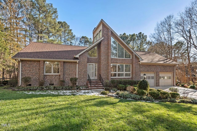 view of front of property featuring brick siding, a shingled roof, concrete driveway, a garage, and a front lawn