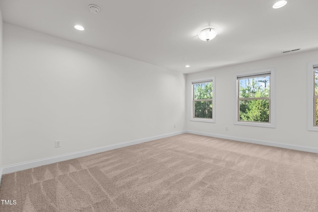 view of carpeted spare room