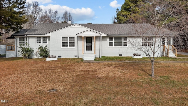 ranch-style house featuring a front lawn