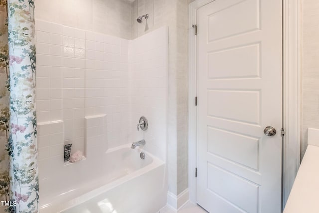 bathroom featuring shower / bath combination with curtain