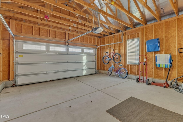 garage featuring a garage door opener