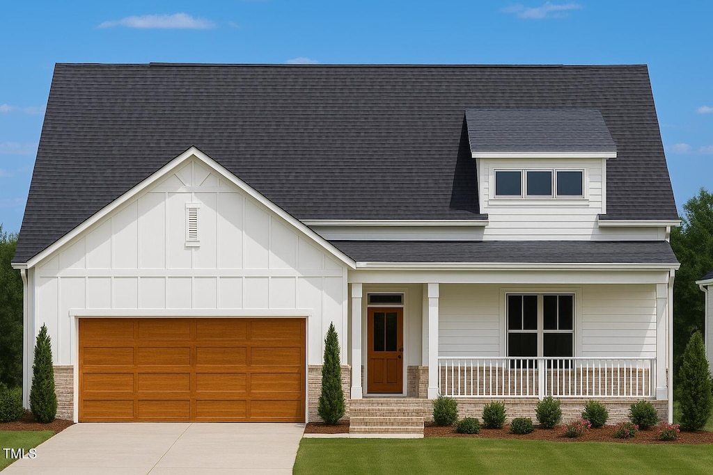 LOT67 Sage Ct, Fuquay Varina, NC 27526 - view of front of house with a porch, driveway, a garage, and stone siding