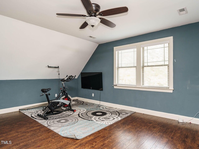 game room with ceiling fan, wood-type flooring, and vaulted ceiling