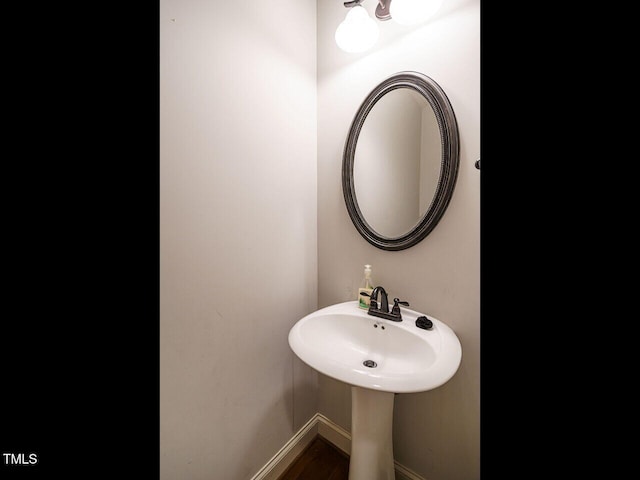 bathroom featuring hardwood / wood-style flooring