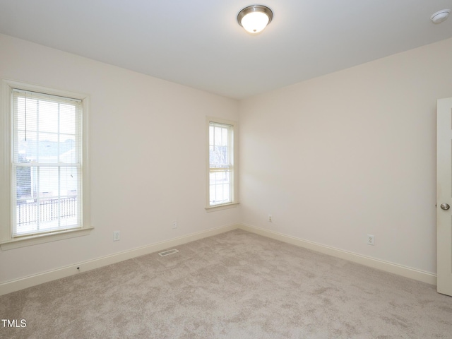 empty room with light carpet