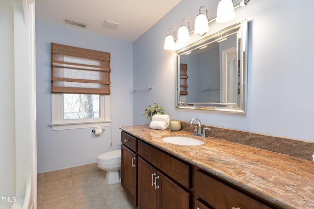 full bath with toilet, tile patterned flooring, visible vents, and vanity