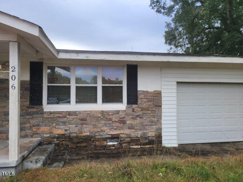 view of home's exterior featuring a garage