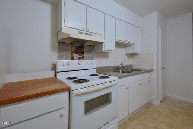 kitchen featuring sink, tasteful backsplash, white cabinetry, and electric stove