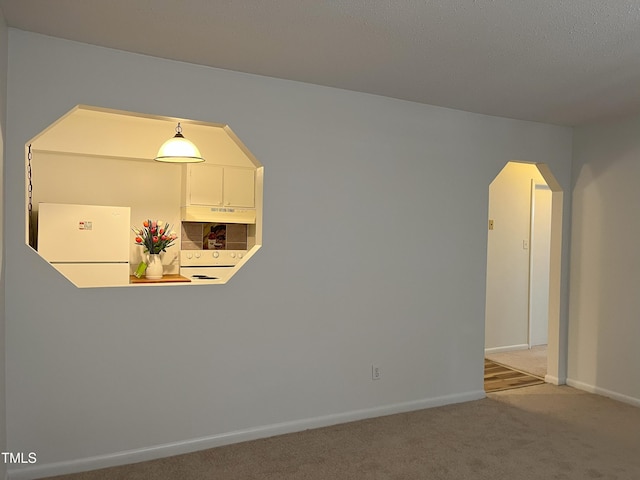 130 S Estes Dr Unit G5, Chapel Hill, NC 27514 - carpeted spare room with arched walkways and baseboards