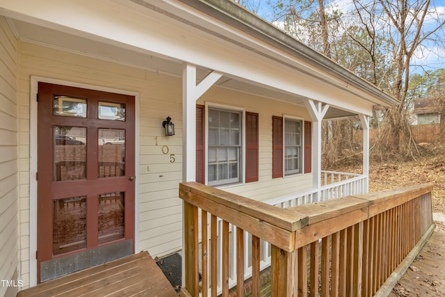 property entrance with covered porch