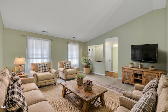 living room with lofted ceiling