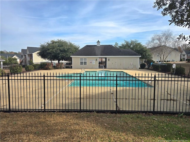 view of swimming pool with a patio area