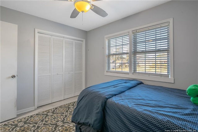 bedroom with a closet and ceiling fan