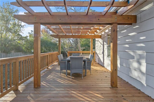 wooden deck featuring a pergola