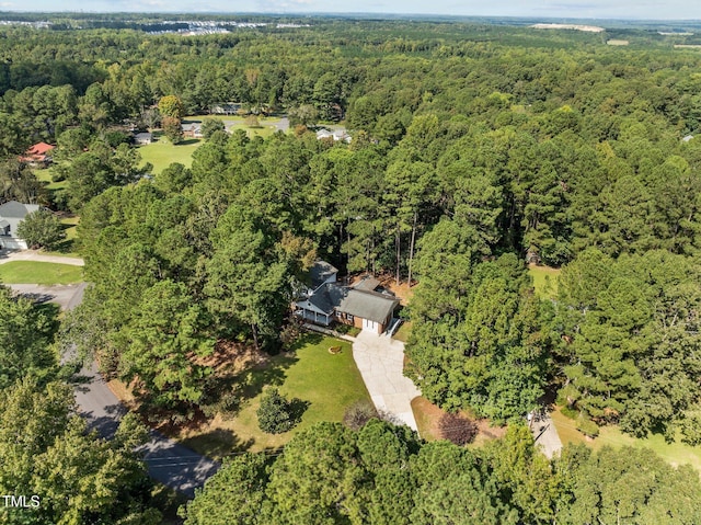 aerial view featuring a view of trees