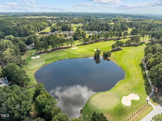 bird's eye view with a water view and golf course view