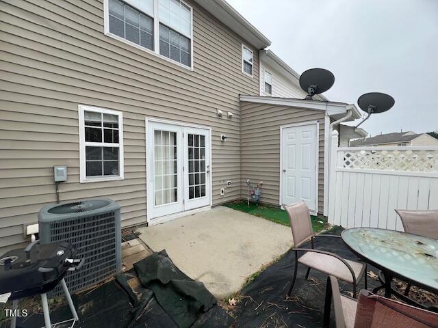 view of patio / terrace featuring french doors and central AC