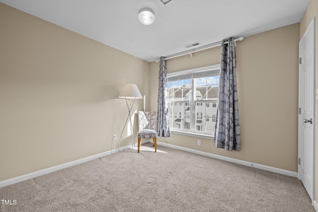 unfurnished room with carpet floors