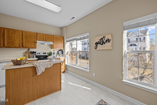 kitchen featuring a center island and stainless steel electric range