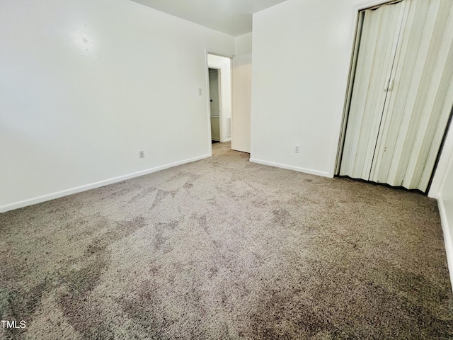 unfurnished bedroom featuring carpet floors