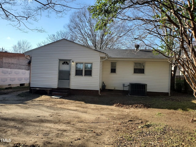 back of property featuring central air condition unit