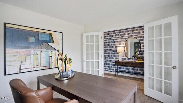 dining space featuring french doors and hardwood / wood-style flooring