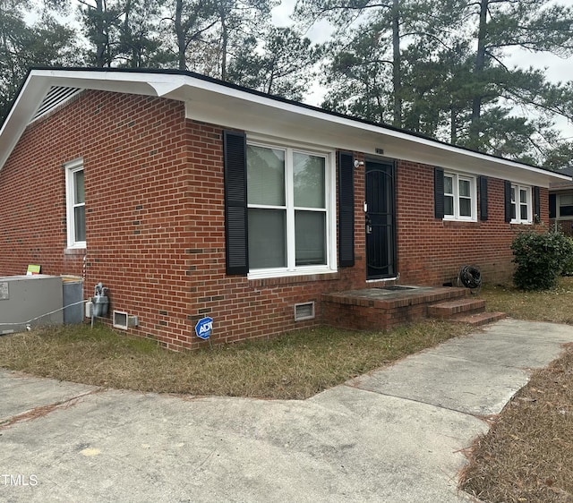 view of front of property with central air condition unit